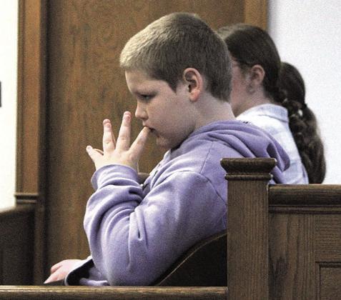 A Lewiston 5th grader carefully considers a witness testimony