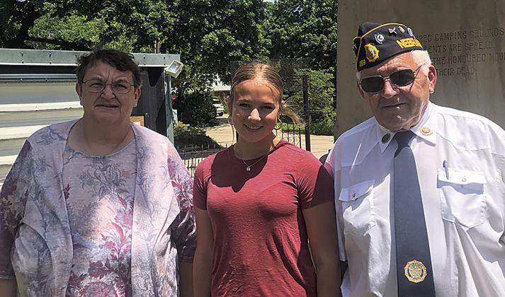 Pictured - Pastor Lori Stevens, Madison Fender, Mike Puhalla. Almost 50 people gathered at the Table Rock Cemetery on Sunday, May 26th to witness the memorial services. Pastor Lori Stevens delivered the sermon. Miss Madison Fender sang God Bless America. American Legion Brown-Hays Post 289 rendered honors. Humbly submitted by: Suzanne Ellis