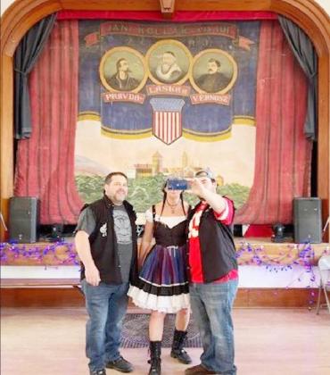 Before a recent performance, Angie Kriz with band members Craig &amp;amp; Jason Falls take a selfie with the stunning curtain