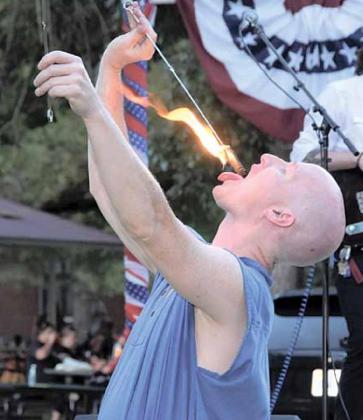 Performers from Drops Unlimited from the Kansas City area, gave a show at the Table Rock Fair Saturday. They used fire and other lighting props like LED to thrill the crowd. Ray Kappel/Republican