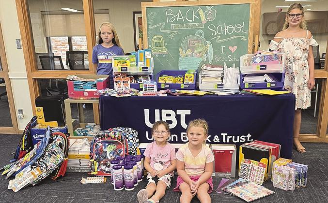 The 4 young ladies presenting the donations to the Back To School Promotion at the bank were front row: Azra Schulenberg, Pawnee City and Chelsea Stephens, Table Rock. Back row: Jayda Tupa, New Cambria, KS and Aubree Marr, Pawnee City.