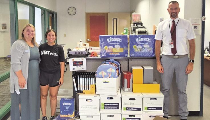 Union Bank &amp;amp; Trust employees Katelynn Stephens, Cortney Johnson and Brian Rottinghaus (Superintendent, Pawnee City Schools), dropping off back-toschool supplies donated for the school to provide to students.