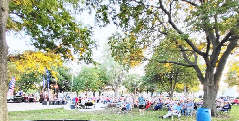 The crowd settles in. Over 500 people attended. Photo by Sherry Winkinhofer