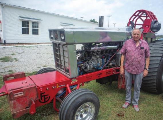 Jim Koch with Underratted II, the engine he built.