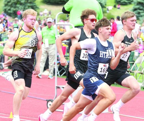 HTRS’ Kameon Dettmann (#163, center) stays in stride with his fellow competitors in the Class D boys’ 800 M. Run on Saturday. He set a personal best time of 2:05.51. Photo courtesy of Stephanie Croston/Seward County Independent