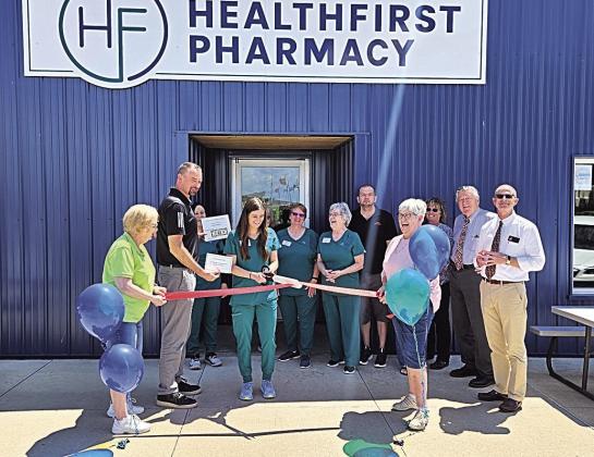 Pawnee City Chamber of Commerce held a ribbon cutting for HeathFirst Pharmacy last Wednesday. Pictured are: Lola Seitz, Chamber President Brian Rottinghaus, Andrea Puhalla, Heidi Kohake (owner), Corrine Nunez, Suzanne Byler, Janet Vetrovsky, Ethan Petrashek, Gail Howard, Cortney Johnson, Nanette Smith, Joe Stehlik, John Werner