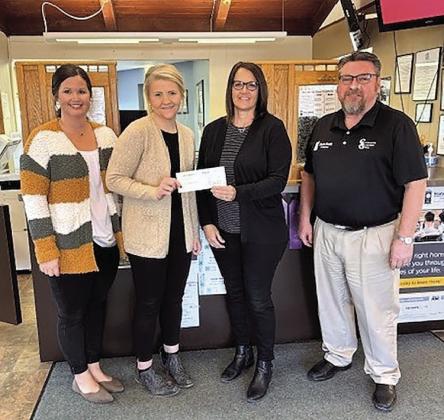Pictured are: Kelly Shupp and Allison James, Humboldt Improvement Project Committee Members, Vicky McNealy, SENCA Executive Director, and Mark Joy, State Bank of Table Rock/Project Committee Member.