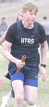 Paula Jasa/Republican HTRS’ Colt McClarnen takes his turn in the boys’ 1600 M. Relay event.