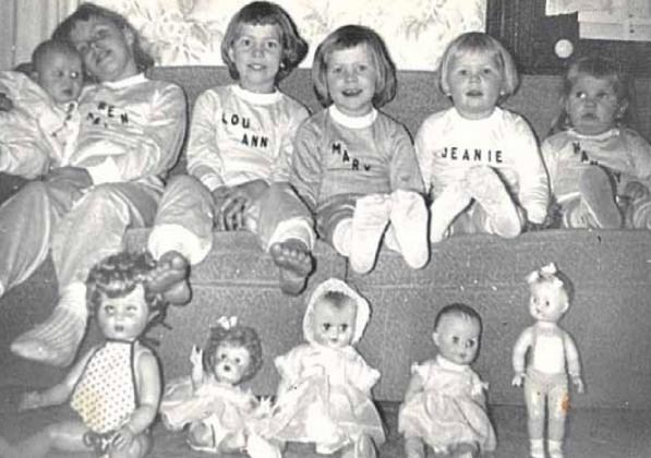 The first six children of Keith and Verna Mae Richardson in the new pajamas they got for Christmas from Aunt Marilyn. Karen is holding Susie.