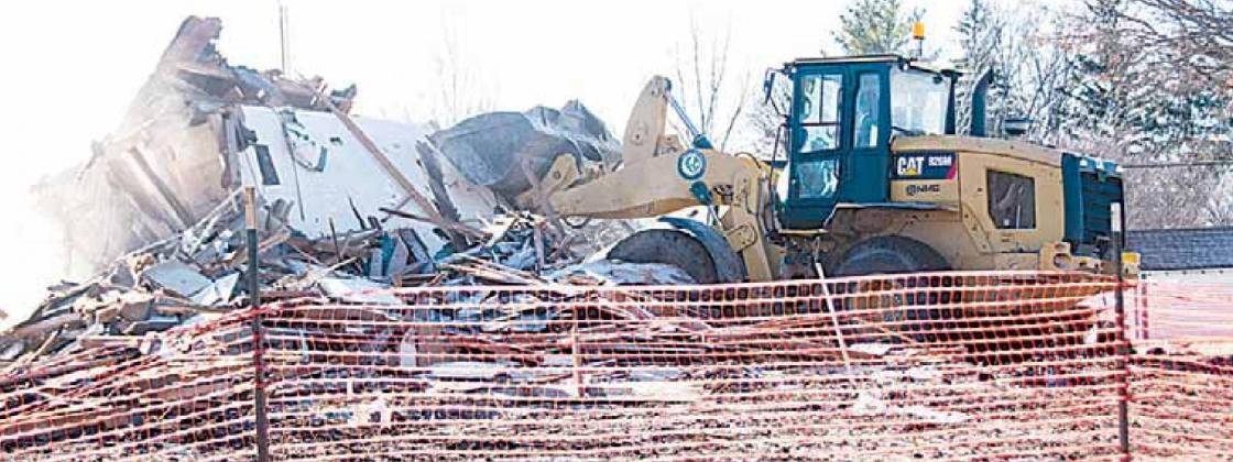 The City Crew was busy last week pushing in the house at the site of the new fire station in Pawnee City. The Crew will get dumpsters to finish hauling the debris off. Ray Kappel/Republican
