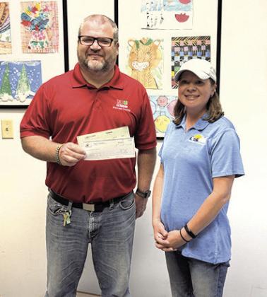 Pictured from left to right: Jason Vetrovsky – Pawnee City Schools Board President, Monica Busboom.