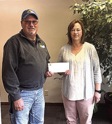 Pictured from left to right: Angela Antholz – SENCA Deputy Director, Jeff Wehrbein – Farmers Cooperative.