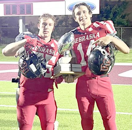 Pictured right are Pawnee City’s Andy Maloley (from left) and Hunter Johnson after helping Nebraska win the 6-man Shootout against Wyoming on Friday night. Pictured above is the entire Nebraska team. photos provided by Jamie Maloley