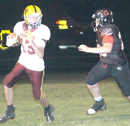 P.C.’s Hayden Binder (#33, right) pursues a Sterling ball-carrier late in the game. Paula Jasa/Republican