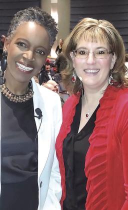 Boston University President Melissa Gilliam and Joy Huber