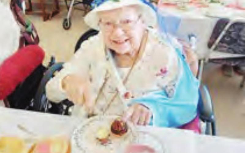 Dorothy Penkava of Table Rock enjoys the tea