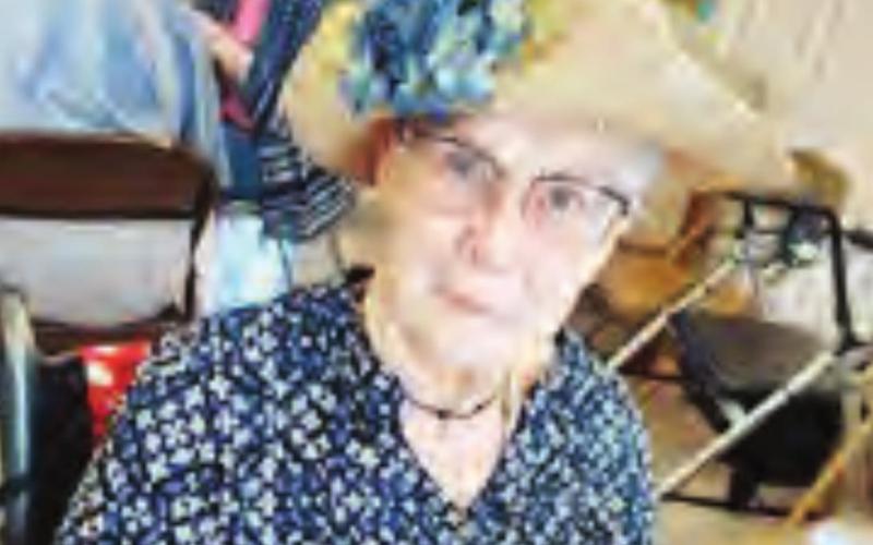 Karen Krofta enjoys herself at the tea party