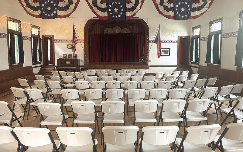 Chairs fill the dance floor at the DuBois ZCBJ Hall in anticipation of a program of classical music in Czech.