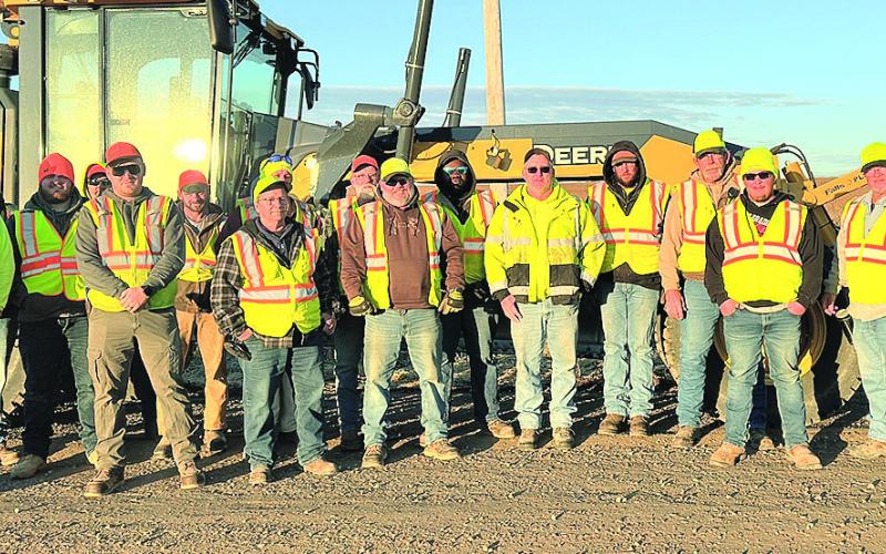 Nebraska Department of Transportation workers pose for a picture before beginning the application of the BaseBindX Photo courtesy of Nebraska Department of Transportation
