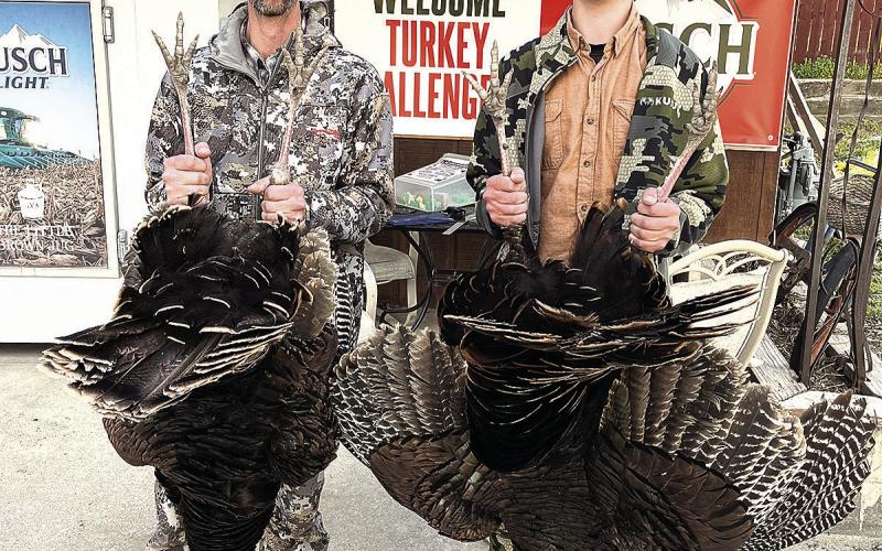 Adult Division winner Everett Bender (left) and the Chunky Thunderchicken Champion Zachary Bender (right)