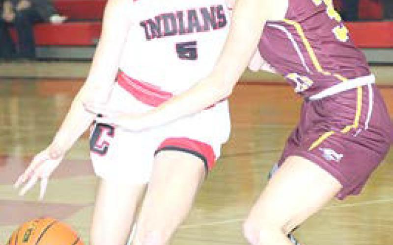 P.C.’s Maddy Osborne drives past a Sterling defender in Friday night’s game against the Lady Jets. Paula Jasa/Republican