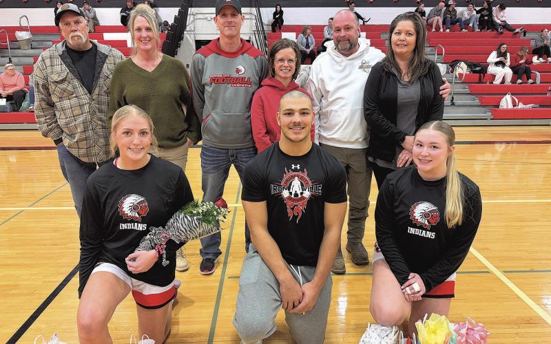 Seniors recognized (left to right) Madelyn Osborne, Atreyu Kling, Abby Dietrich, not pictured Tyler Tegtmeier. photo by Anne Veleba