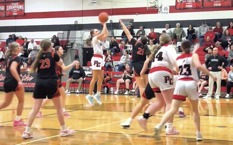 Kinsley Benson, #3, with a pull-up jumper for two of her game high 14 points. photo by Joe Norman