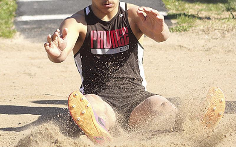 Paula Jasa/Republican P.C.’s Trey Kling makes a sand splash in the boys’ Triple Jump event.