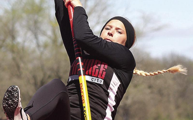 Paula Jasa/Republican P.C.’s Madison Fender elevates in the girls’ Pole Vault event.