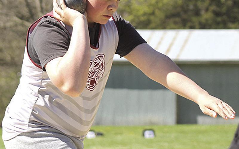 Paula Jasa/Republican LHS’ Taven Borcher gets ready to launch his throw in the boys’ Shot Put event.