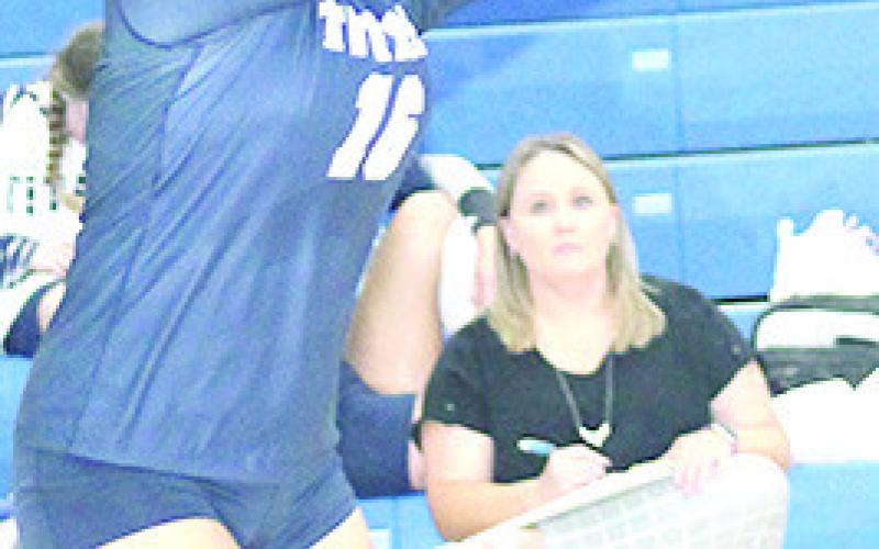 HTRS’ Izzy Hammer (#16, left) directs her serve receive pass to the front row at the Mudecas last week. Paula Jasa/Republican