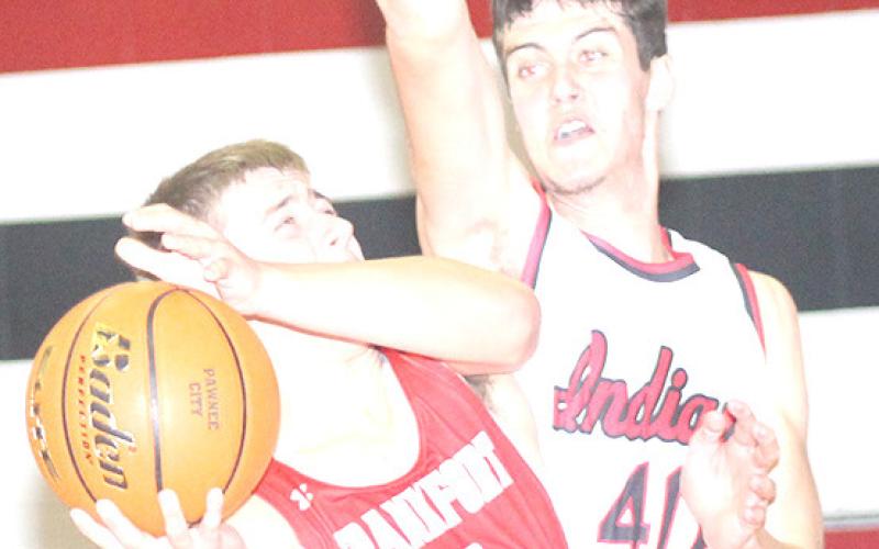 P.C.’s Oscar Machini (#40, right) goes up for a block against a Frankfort, Ks. player on Friday night. Paula Jasa/Republican