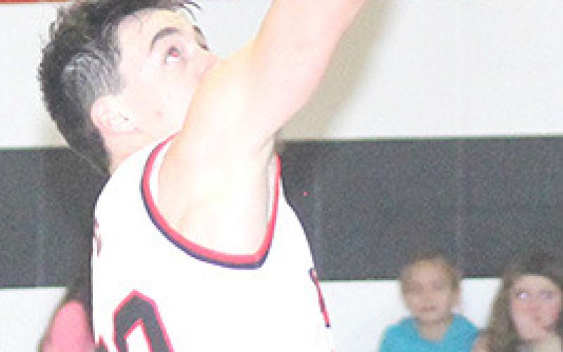P.C’s Jett Farwell scores on a steal and layup against Frankfort, Ks. Paula Jasa/Republican