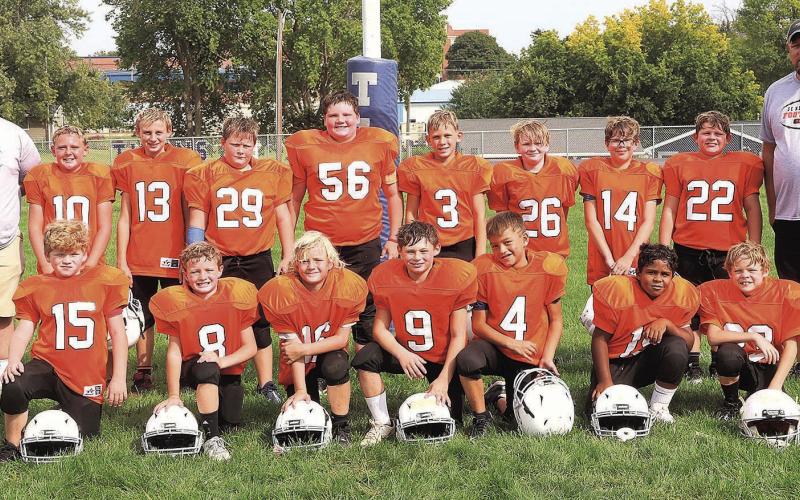 3-4th grade SE NE Tigers Team: (Back-standing) Coach Heath Finke, Brett Seematter, Noah Marr, William Tichy, Jacob Jones, Gus Glathar, Robert Arnold, Ryker Holliday, Noah Herr, Coach Trent Glathar; (Kneeling) Carter Arnold, Bobby Hoffman, Elijah Hoffman, Ryker Townsley, Junior Mena-Rey, Royce Nunez, Chett Hutton