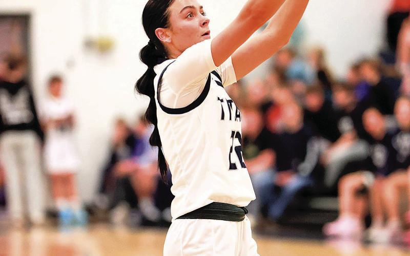 HTRS Titan Lillian Bowen outside arc. Bowen made 3 treys in all, 11 points in all. The team had 6 treys.