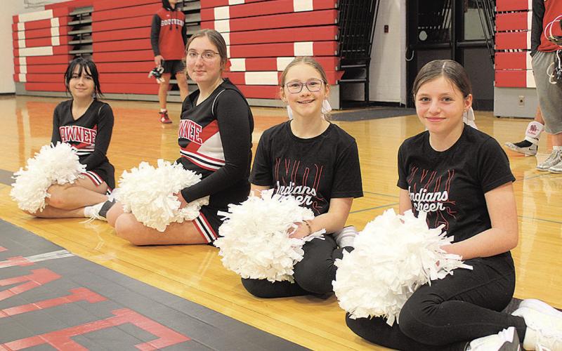 Lovely Pawnee City Cheerleaders (L to R) Tiffany Sampont, Addison Petersen, Ella Wernimont and Lisa Holthus pause their cheering to smile for the camera!