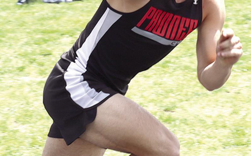 P.C.’s Anthony Kling gets off to a strong start in the boys’ 400 M. event at the Pioneer Conference Meet. Paula Jasa/Republican