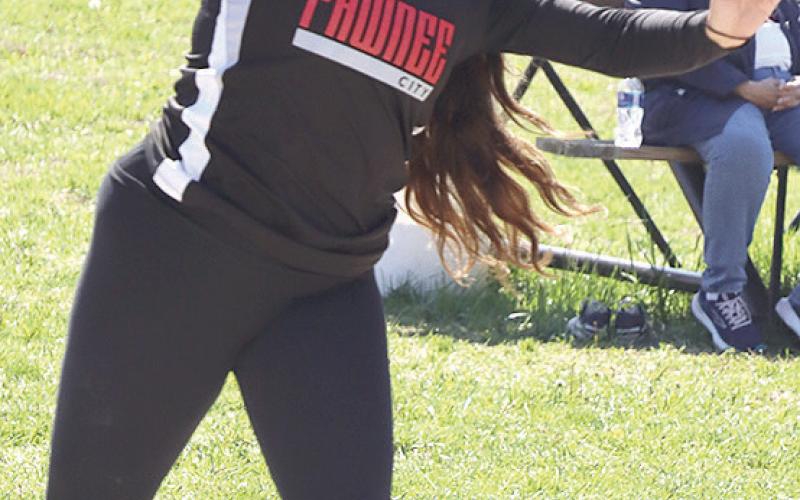 P.C.’s Shayla Puhalla goes for a big toss in the girls’ Shot Put event at the Pioneer Conference Track Meet. Paula Jasa/Republican
