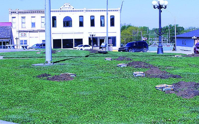 Volunteers Install New Flag Poles On Courthouse Lawn