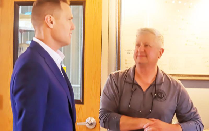 Republican candidate for Governor Brett Lindstrom chats with Mike Schilling at SchillingBridge Winery and Microbrewery last Wednesday. He spoke to a small crowd on a campaign stop here. Ray Kappel/Republican