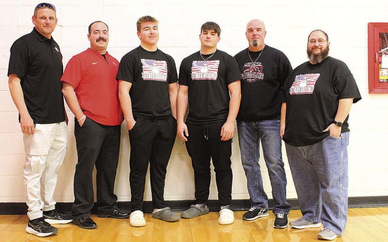 The Pawnee City Wrestling Team enjoyed a pep rally at the school before heading off to the competition in Omaha. From left to right: Coach Jacob Schuetz, Assistant Coach Koalton Taiclet, Sophomore Gauge Schuetz, Junior Dylan Layne, Assistant Coach Michael Layne and Assistant Coach Jacob Otero.