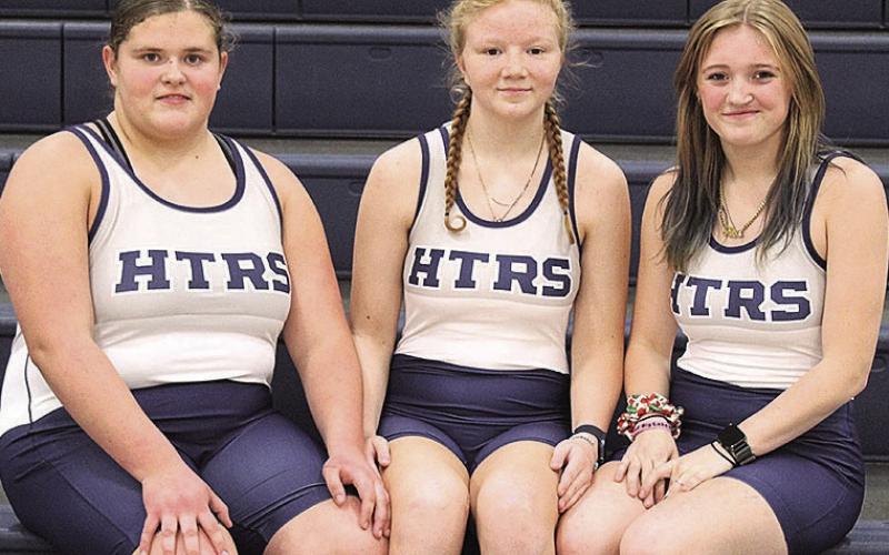 Members of the 2025-26 HTRS Wrestling Team are Ava Grimes, Shawnna Richey, Lorena Pagnano.