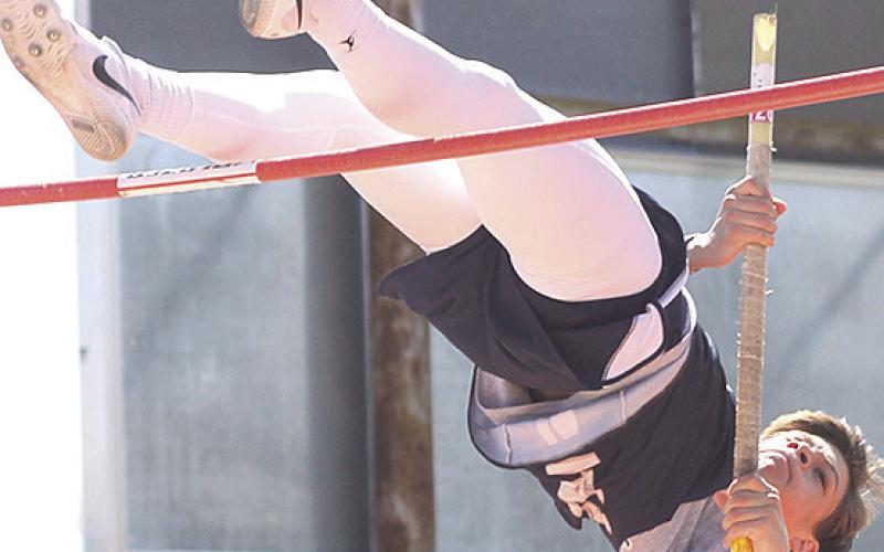 Paula Jasa/Republican HTRS’ Kameon Dettmann attempts to go up and over the bar in the boys’ Pole Vault event last Tuesday.