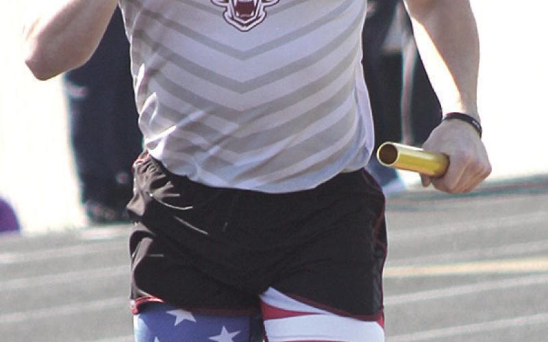 LHS’ Tristen Ray rounds the corner in the boys’ 3200 M. relay at the Lewiston Invitational last Tuesday. Paula Jasa/Republican