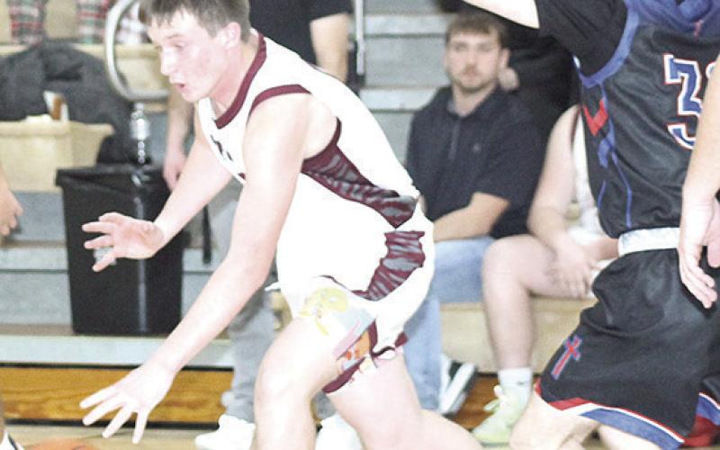 LHS’ Grady Weyers drives the ball through traffic against Parkview on Thursday night. Paula Jasa/Republican