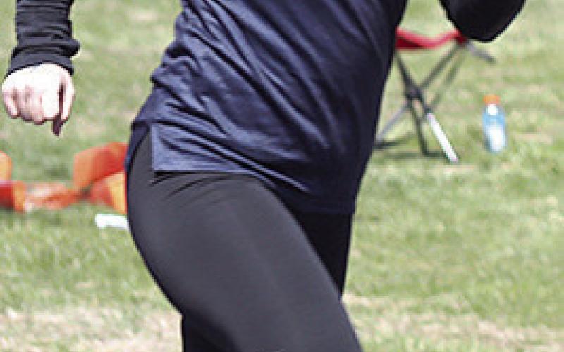HTRS’ Maddie Bredemeier strides out in the girls’ 400 M. Dash. Paula Jasa/Republican