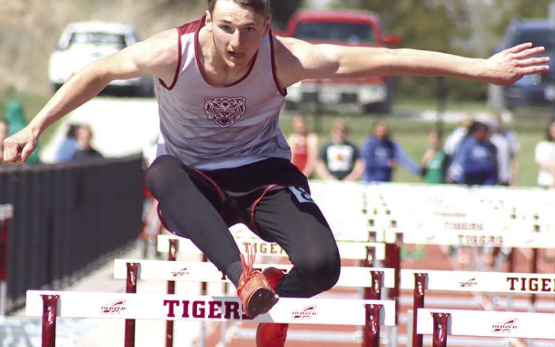 Lewiston’s Payton Heideman clears his final hurdle of the 110 M. event. Heideman finished 8th in this event, but placed 5th in the 300 M. hurdles clocked at 45.19. Paula Jasa/Republican
