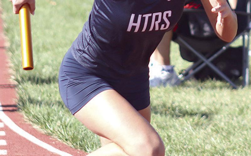 HTRS’ Lillian Bowen’s quick start in the 1600 M. relay helped earn the Lady Titans a silver medal. Paula Jasa/Republican