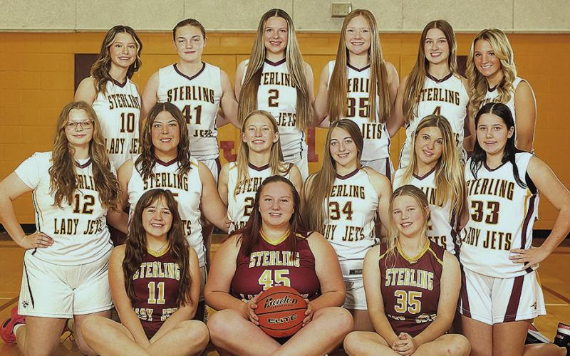 Members of the 2025-26 Lewiston/Sterling Girls’ Basketball Team are from left: front row: Jubilee Matkins, Dakota Andrews, Ayden Hunzeker; middle row: Vivienne Johnson, Bryleigh Crouse, Jocelyn Rathe, Alexandra Vollman, Arielle Bolen, Katelyn Hazen; back row: Braylee Houghton, Sara Wiles, Kynli Portwood, Isabella Lempka, Taylor Truscott, Justice Currie Photo credit: Becky Bartels - Blue Skies Photography
