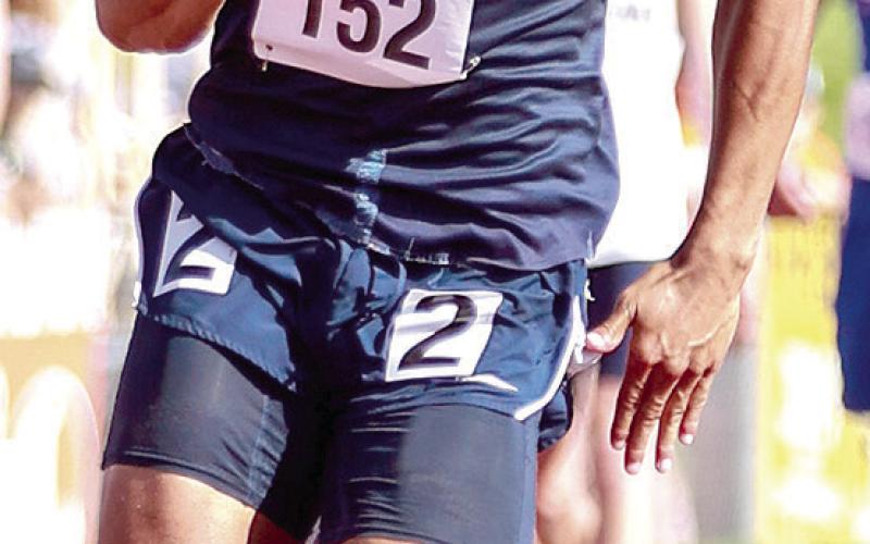 HTRS’ JJ McQueen gets out of the blocks quickly in the Class D boys’ 200 M. Dash finals where he medaled. Photo courtesy of Lorrie Novak